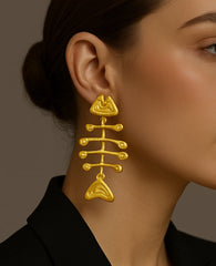 geometric statement earrings with tribal fishbone motif – ORA
