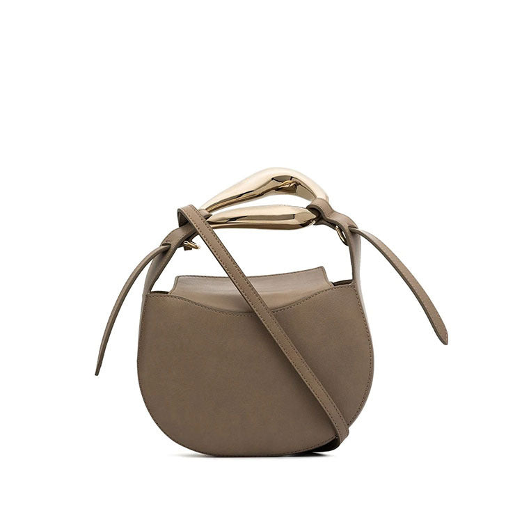 sculptural-handle saddle bag in tan leather – ARIS