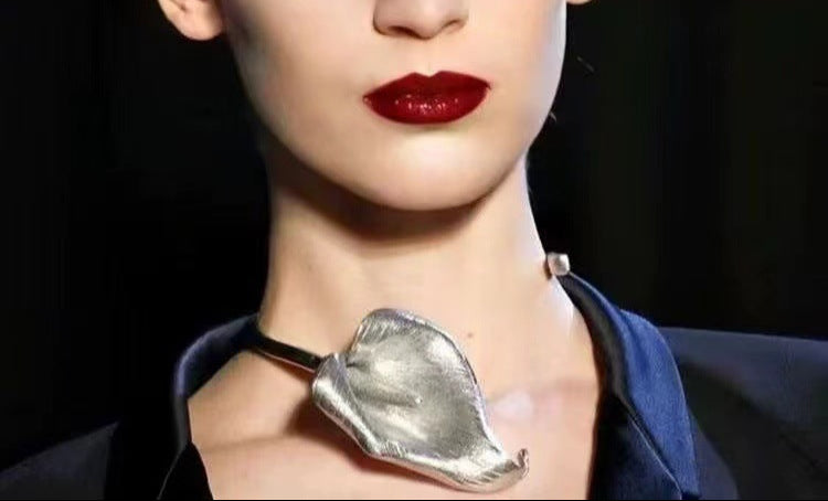 Open cuff bracelet with sculptural petal detail - Vonda