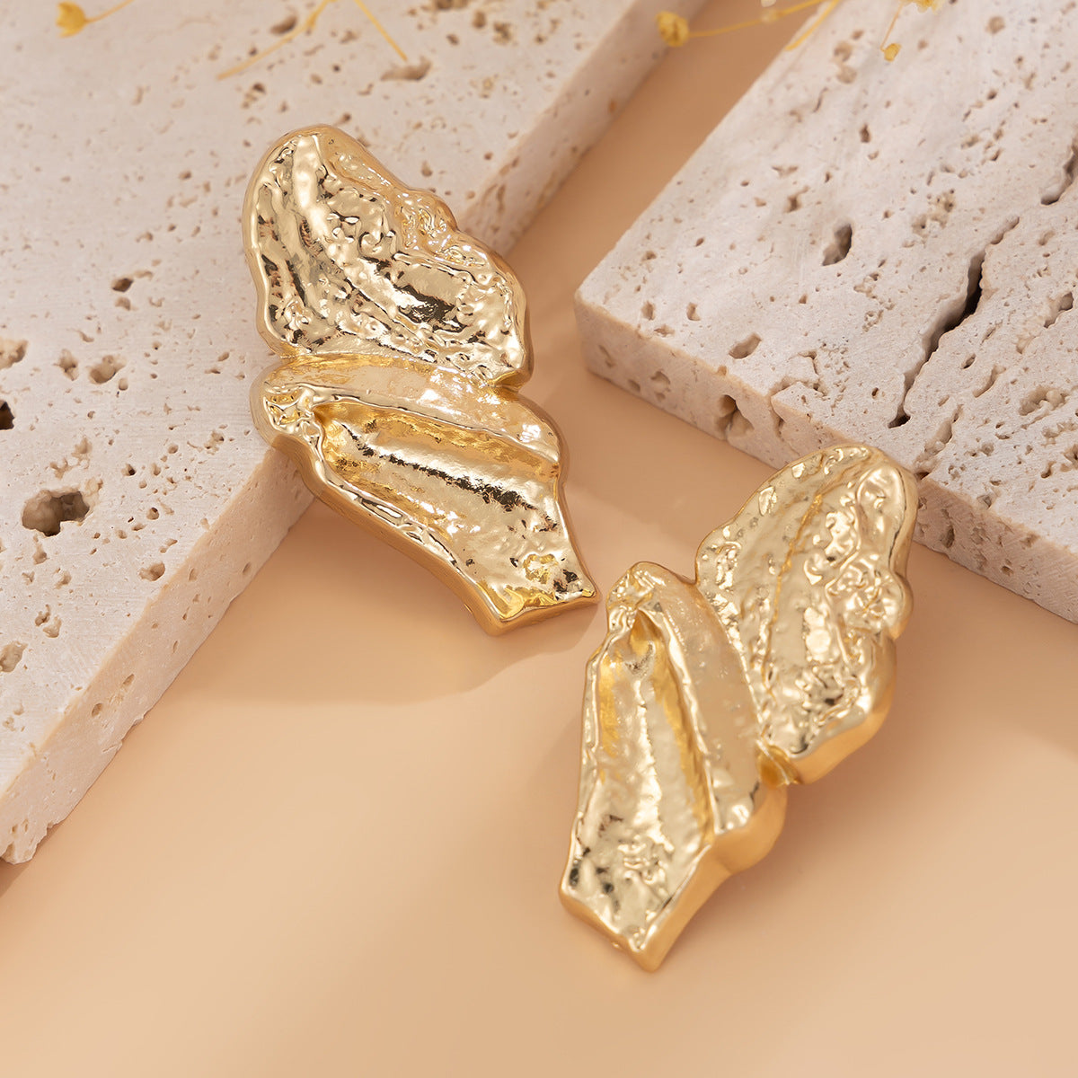 Textured molten double-layer earrings with sculptural finish - Vadvy