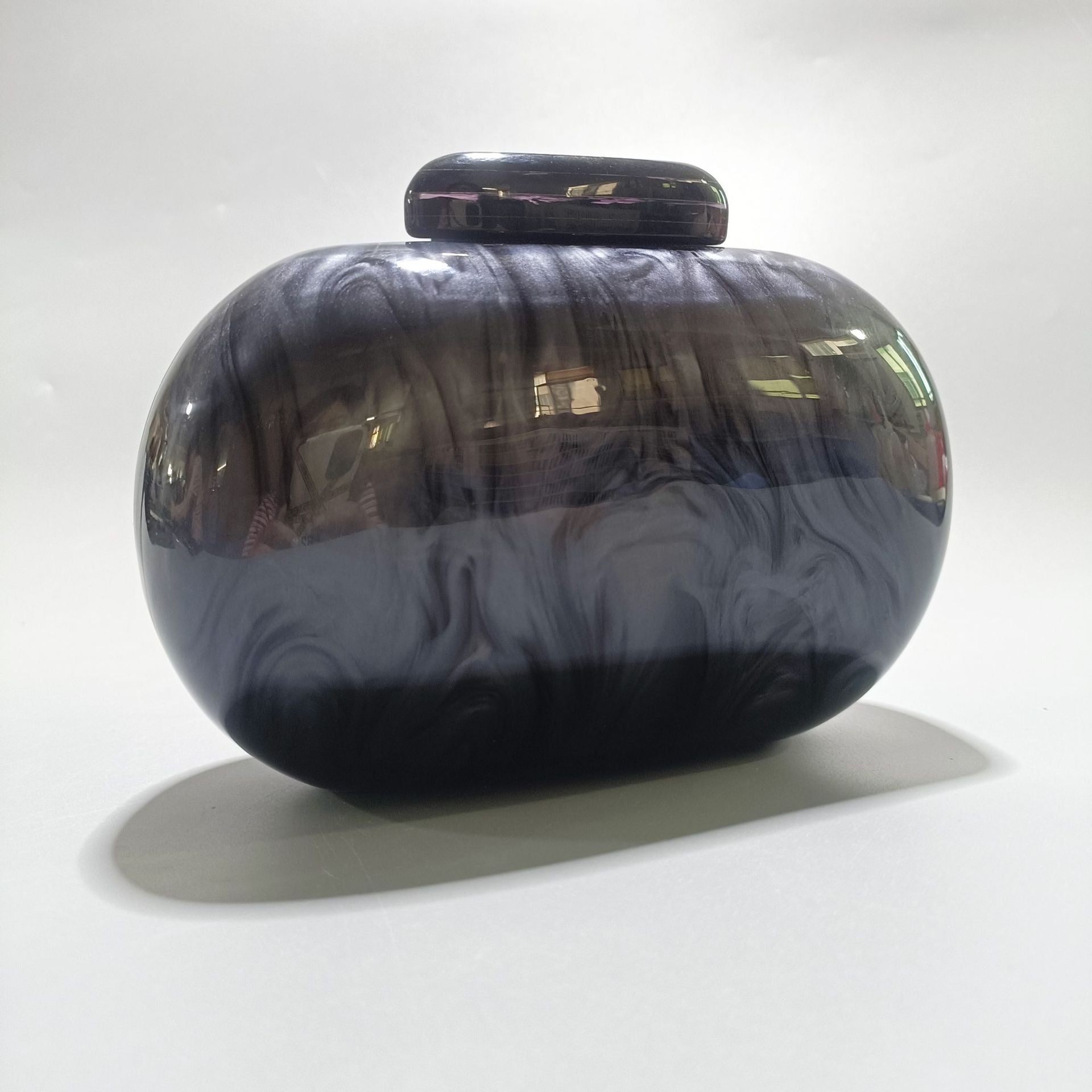 Marbled acrylic clutch with metal ring handle - Sundi