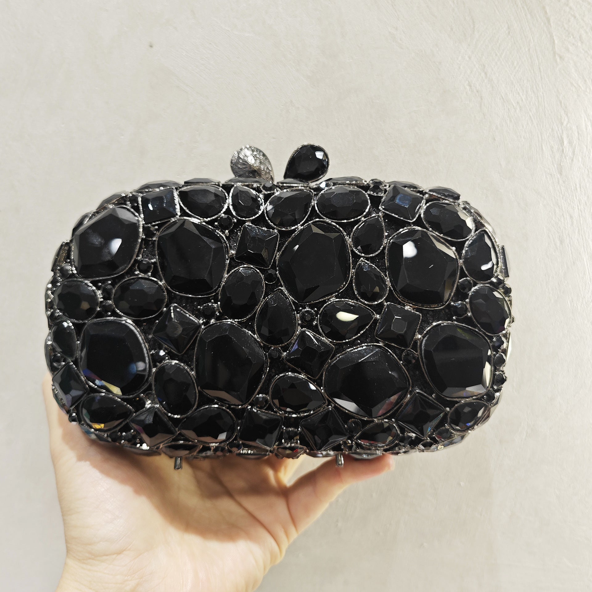 Elegant embellished clutch with geometric crystal accents - Onry