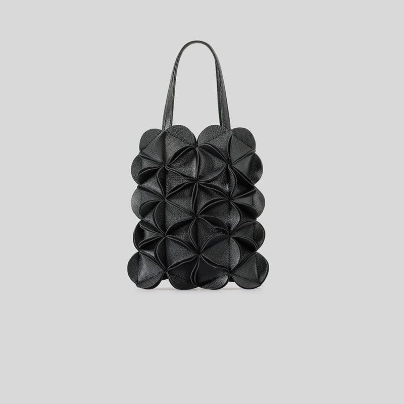 sculpted leather tote bag with floral petal design – ONYX