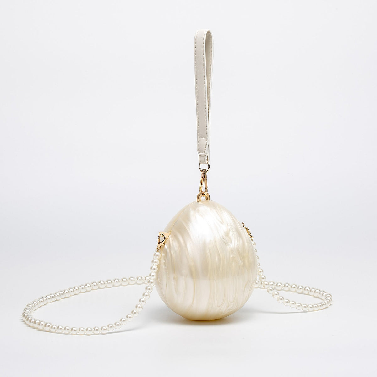 Egg-shaped pearl-accented clutch with detachable chain strap - Lijdu