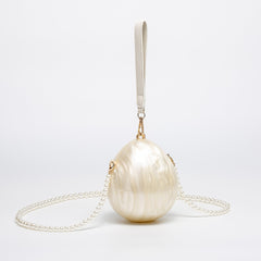 Egg-shaped pearl-accented clutch with detachable chain strap - Lijdu