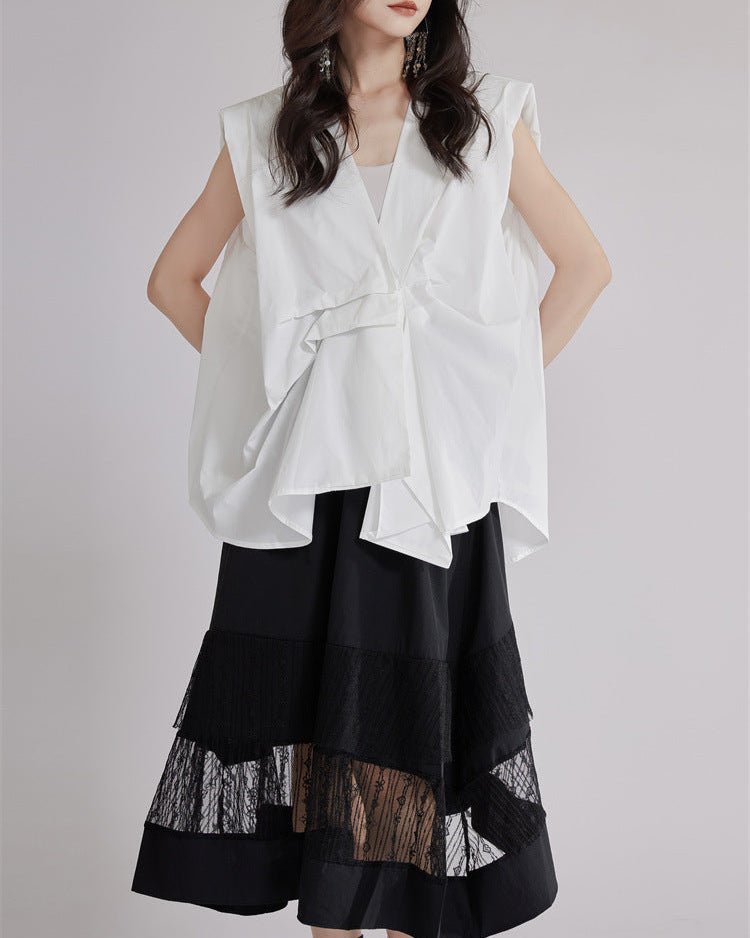 Sleeveless shirt with asymmetrical pleats - Lima