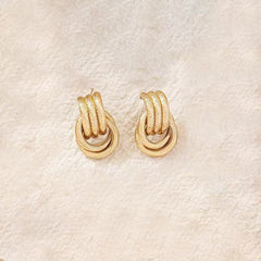 Twisted rope hoop earrings with interlocking loops – Nilker