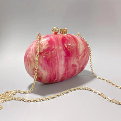 Oval marble clutch with gold clasp and chain handle - Zigru