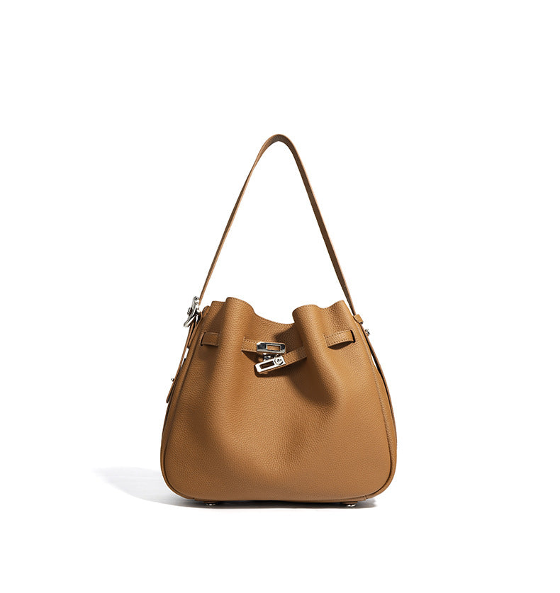 textured leather bucket bag with turn-lock strap – CAMELIA