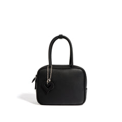 black boxy handbag with heart charm – LYRA