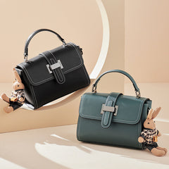 boxy leather handbag with buckle strap & bunny charm – TEAL