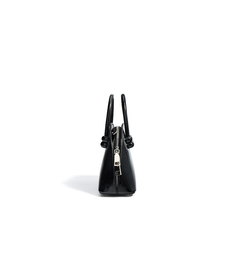 mini dome handbag with top knot handles - NOLVA