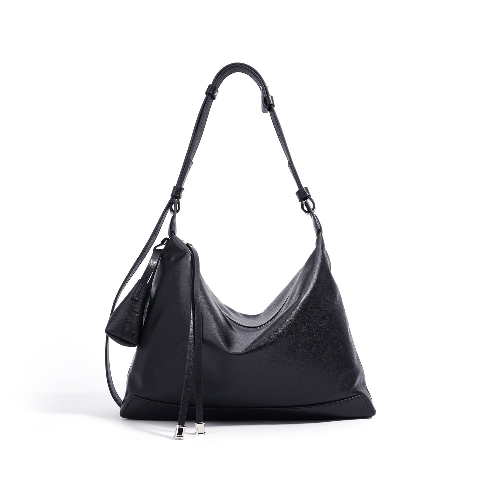 slouchy leather shoulder bag with minimalist charm – NOVIR