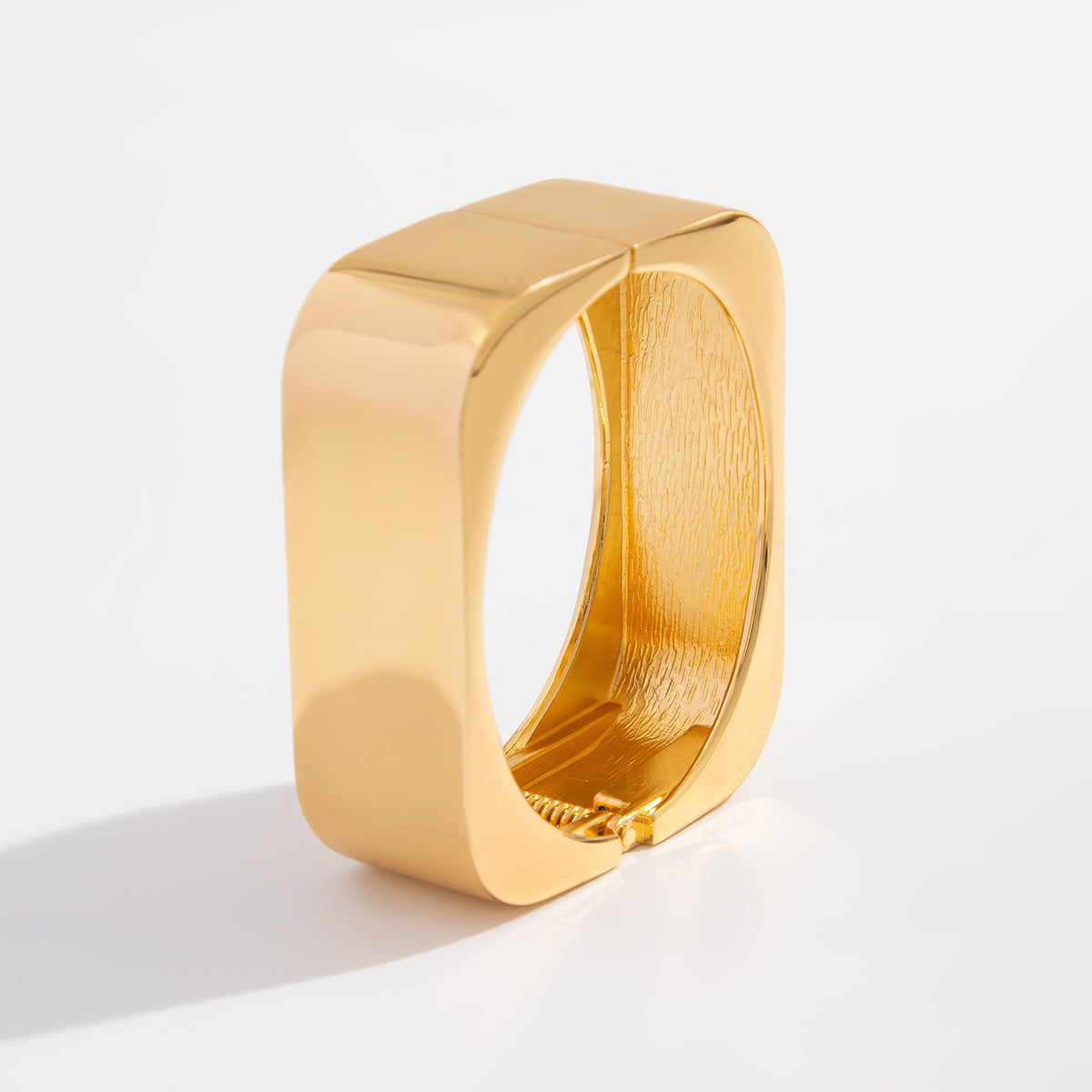 wide sculpted cuff bracelet in high-shine gold – ARDON