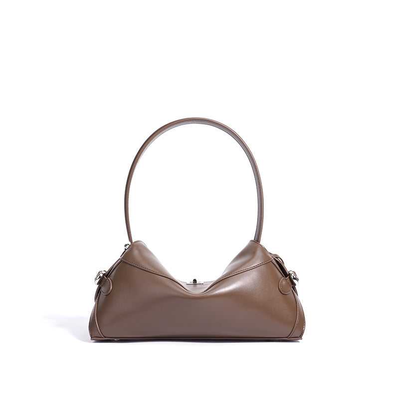 curved suede shoulder bag with flap closure – AURA