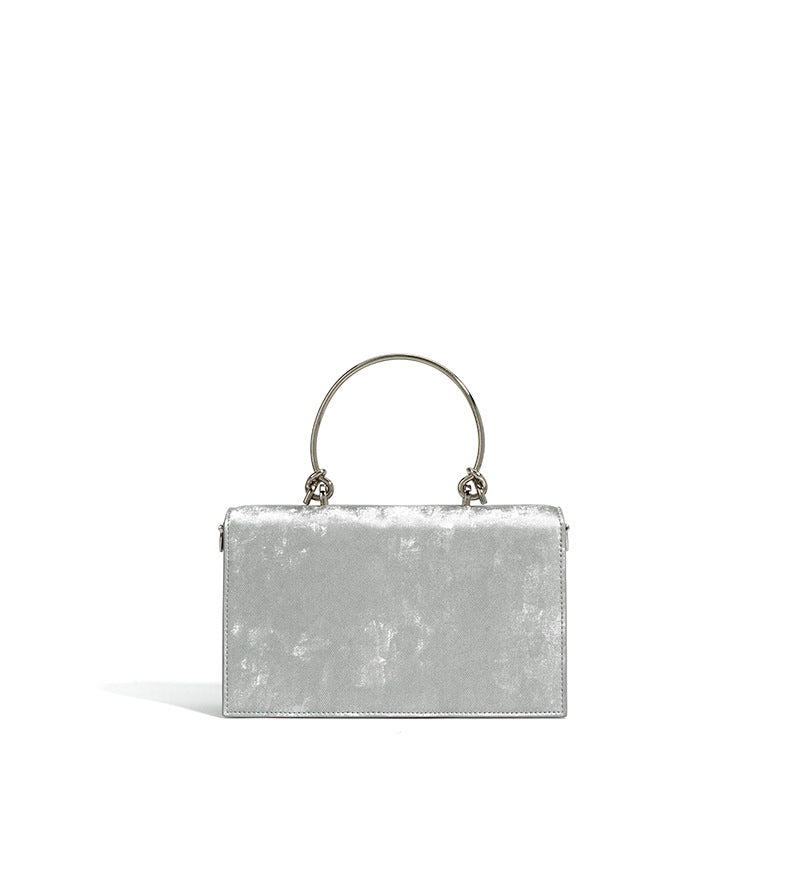 structured velvet top-handle bag with stone clasp – AMORAM