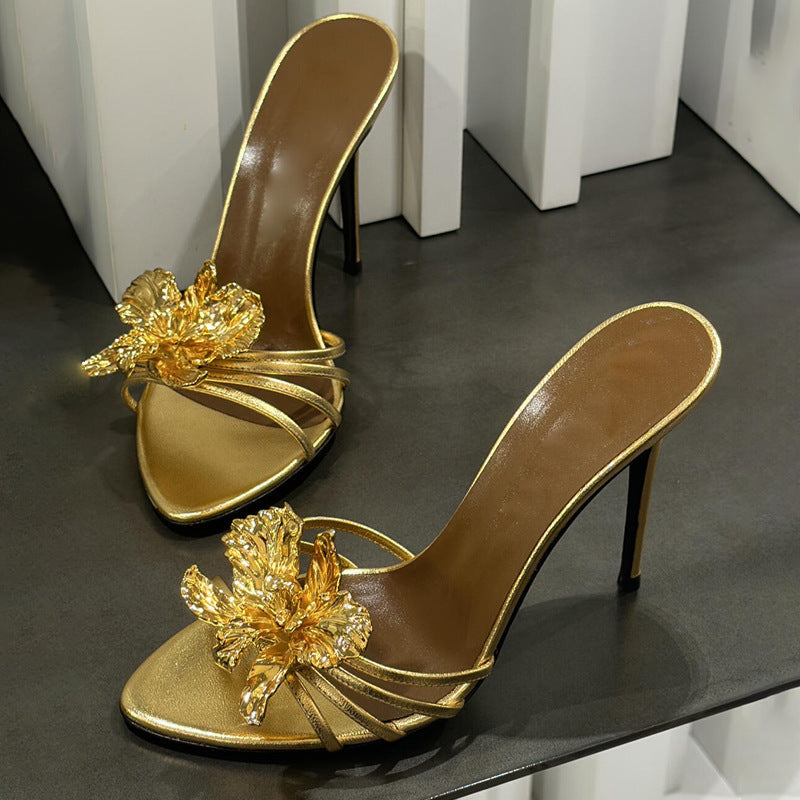 black stiletto mules with gold sculpted flower – CALISTA
