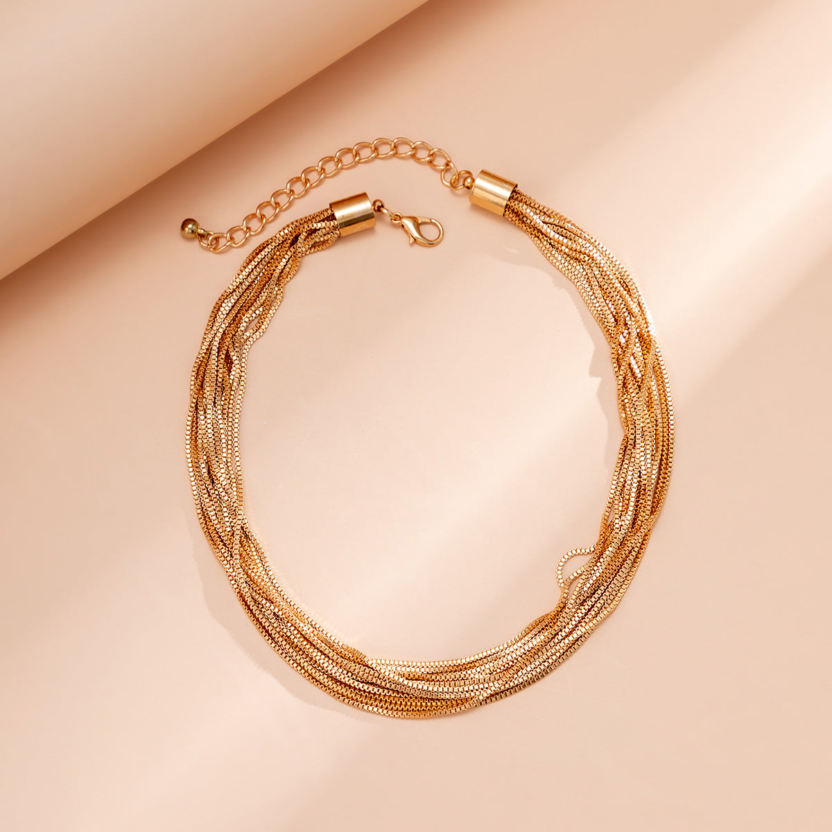 Multi-strand chain necklace with textured layers - Nimlu