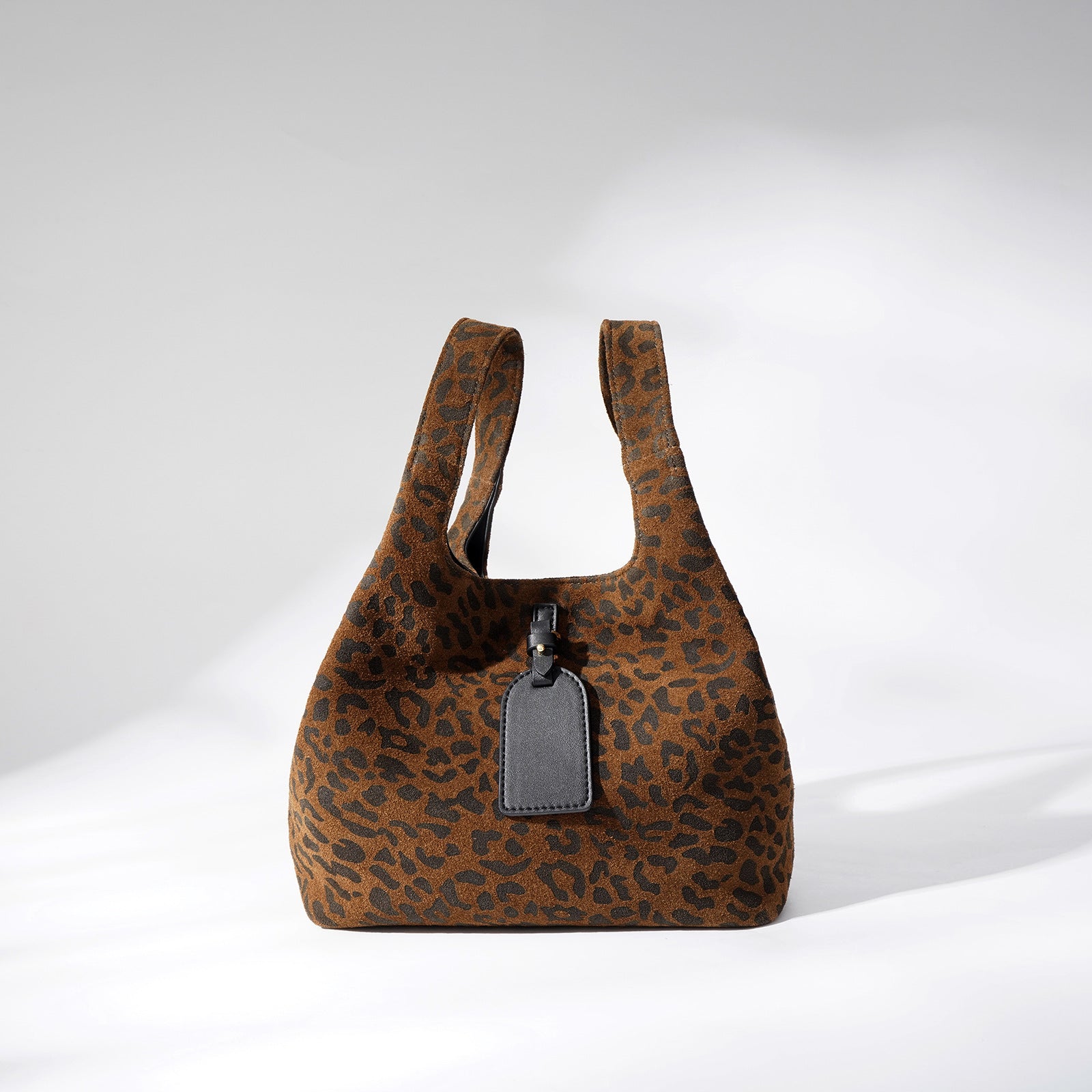 leopard-print suede tote with tag detail – NALA