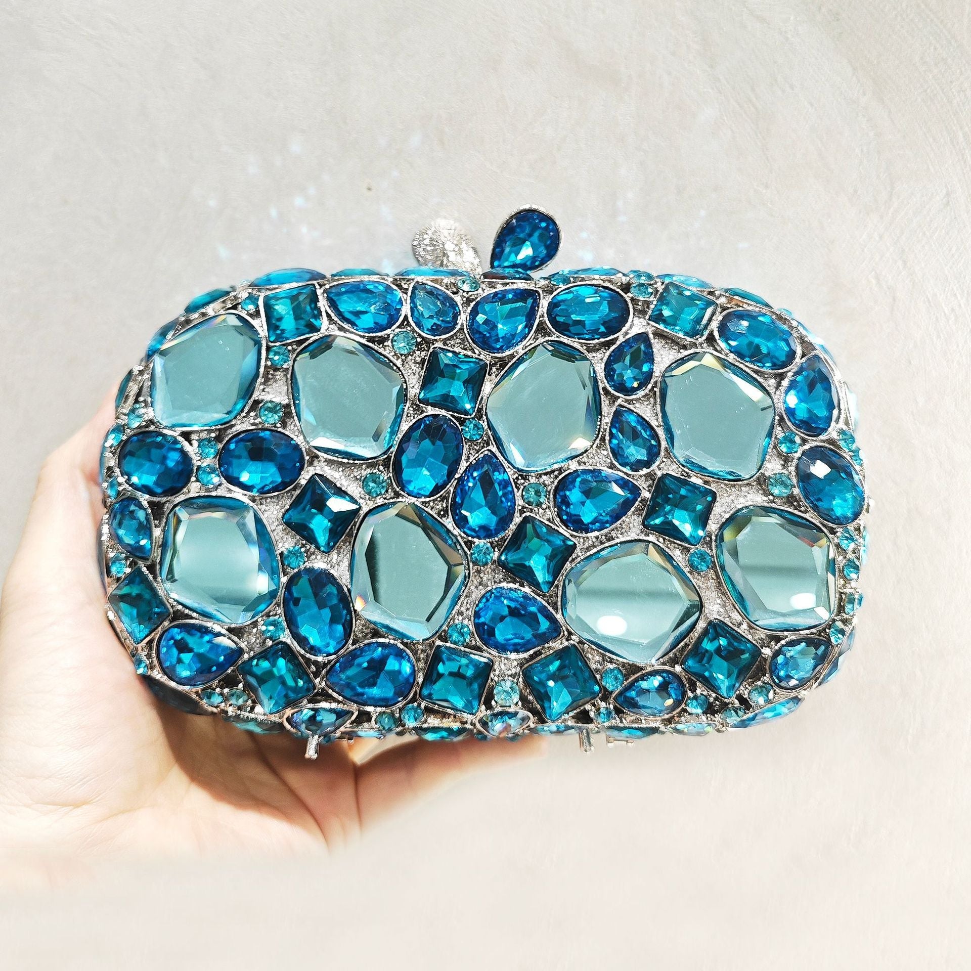 Elegant embellished clutch with geometric crystal accents - Onry
