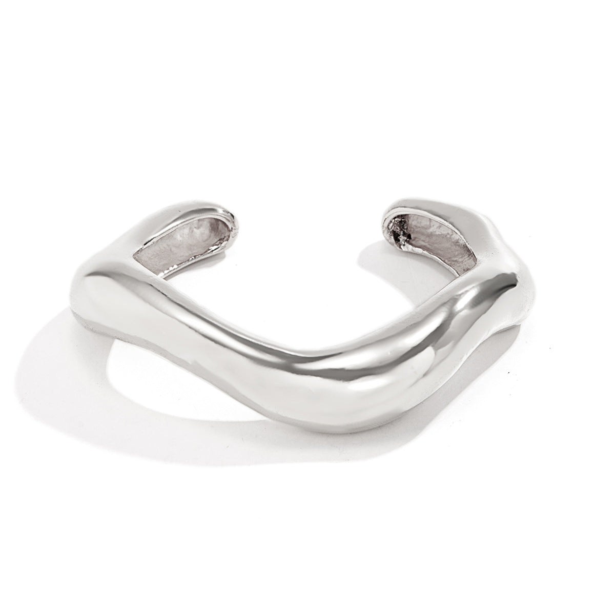 Asymmetric sculpted cuff bracelet in high-shine finish – Niklu