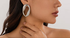 Organic oval earrings with sculpted curves – Zandi
