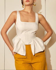 Sleeveless corset blouse with peplum folds - Renia