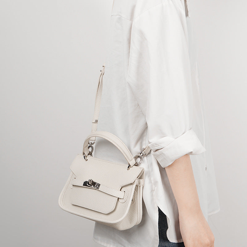 structured mini top-handle bag with belt lock – NOOQL