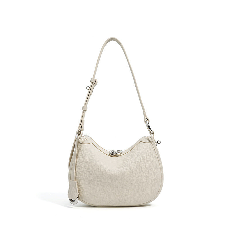 textured leather crescent bag with top handle - LAYLONA