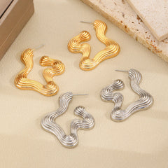 Ribbed abstract wave earrings with sculptural curves - Vasdy