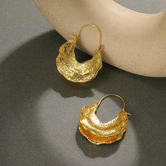 Molten crescent hoop earrings with textured finish – Zolix