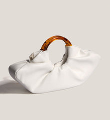 ruched clutch with tortoiseshell ring handle – VERA