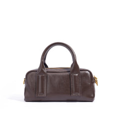 Structured top-handle handbag with bold strap detailing - LUNCA