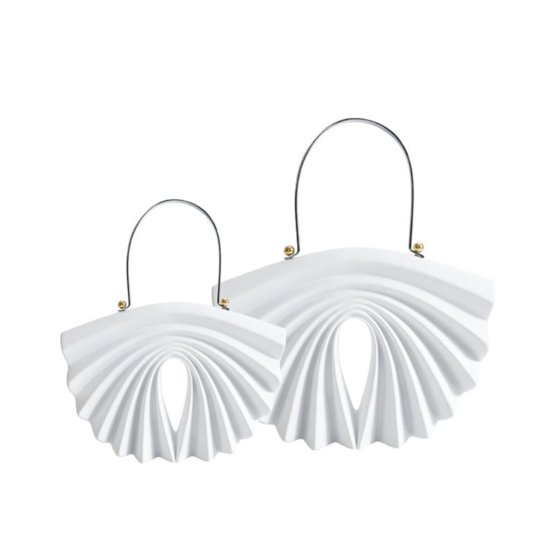 culpted accordion shell bag with metal top handle – LUCIDA