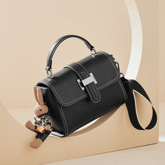 boxy leather handbag with buckle strap & bunny charm – TEAL