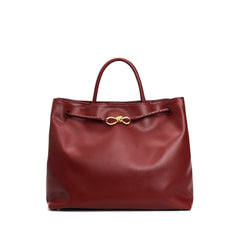 tote bag with braided rope handle and gold knot detail – NASRU