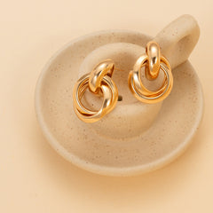Interlocking round hoop earrings with gold finish - Orboni