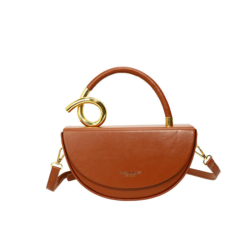 half-moon leather handbag with gold spiral handle – ORENA