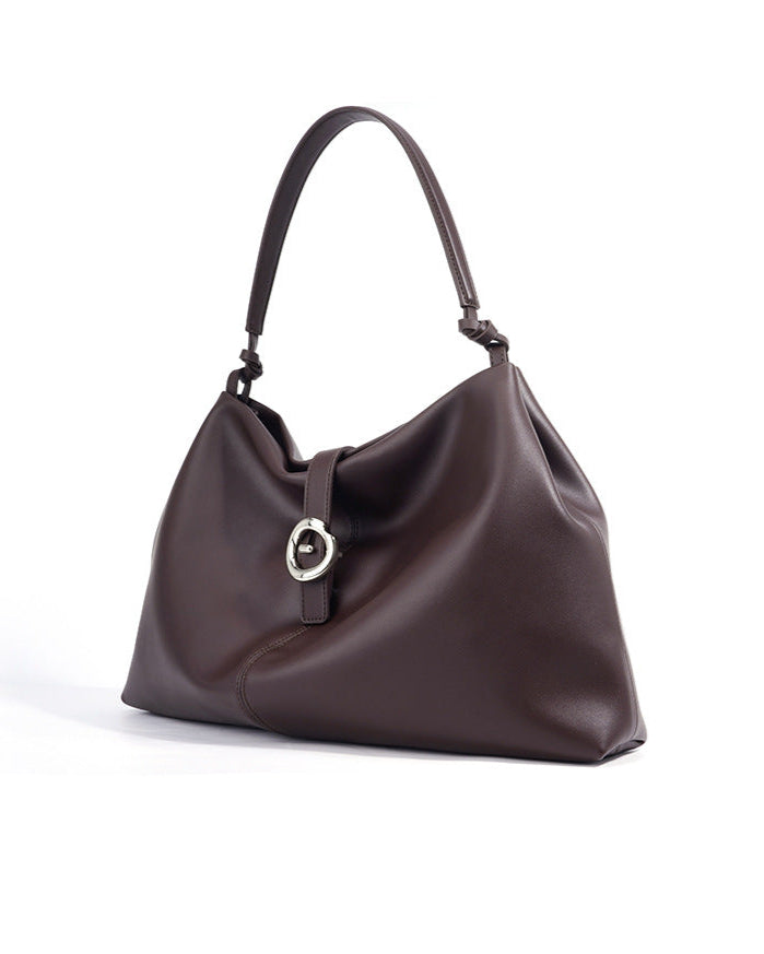 slouchy shoulder bag with circular buckle strap - CASSIAZ