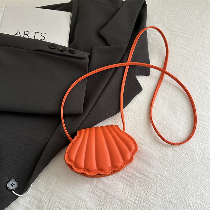seashell leather crossbody bag in coral orange – MAREA