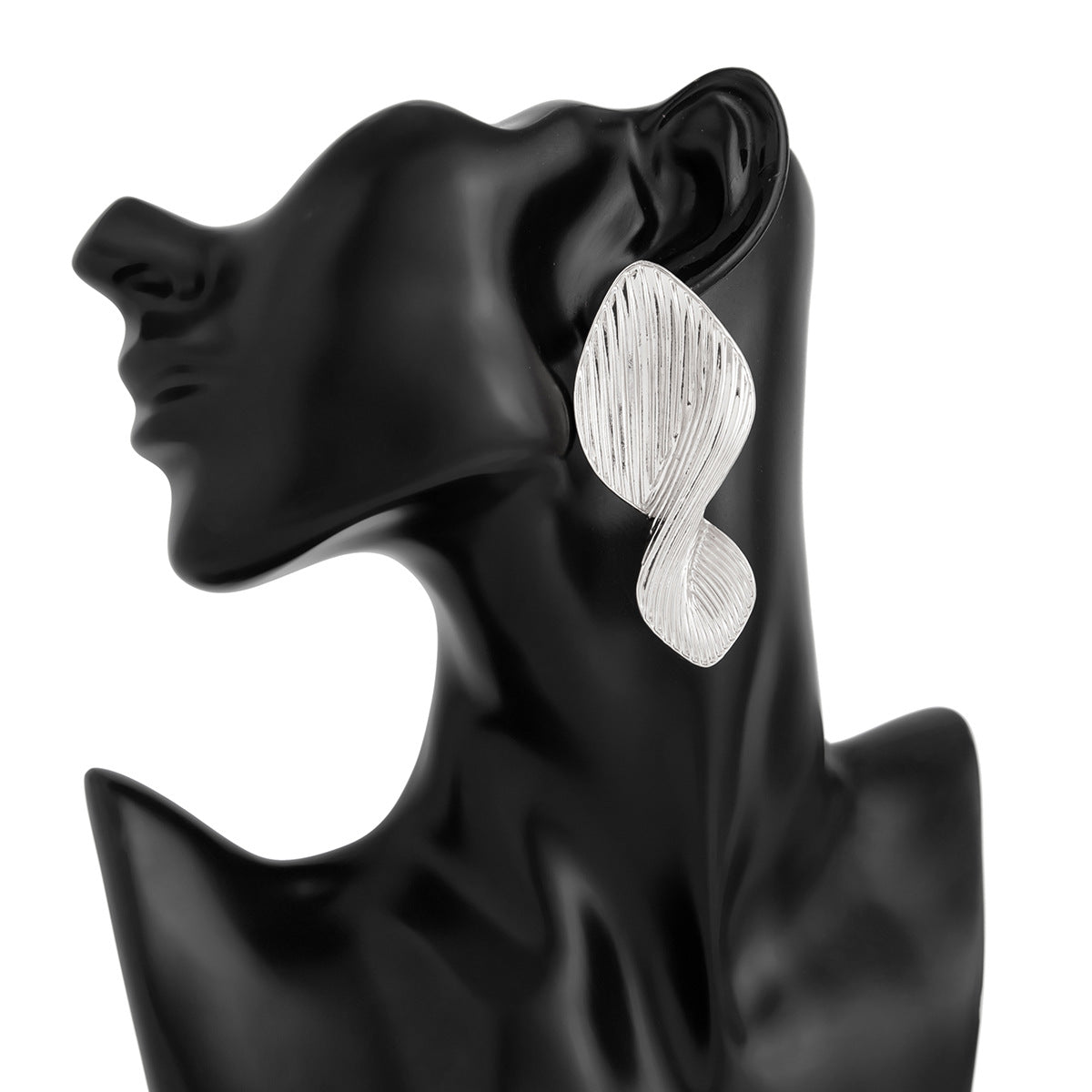 Textured leaf drop earrings with organic twist - Azina