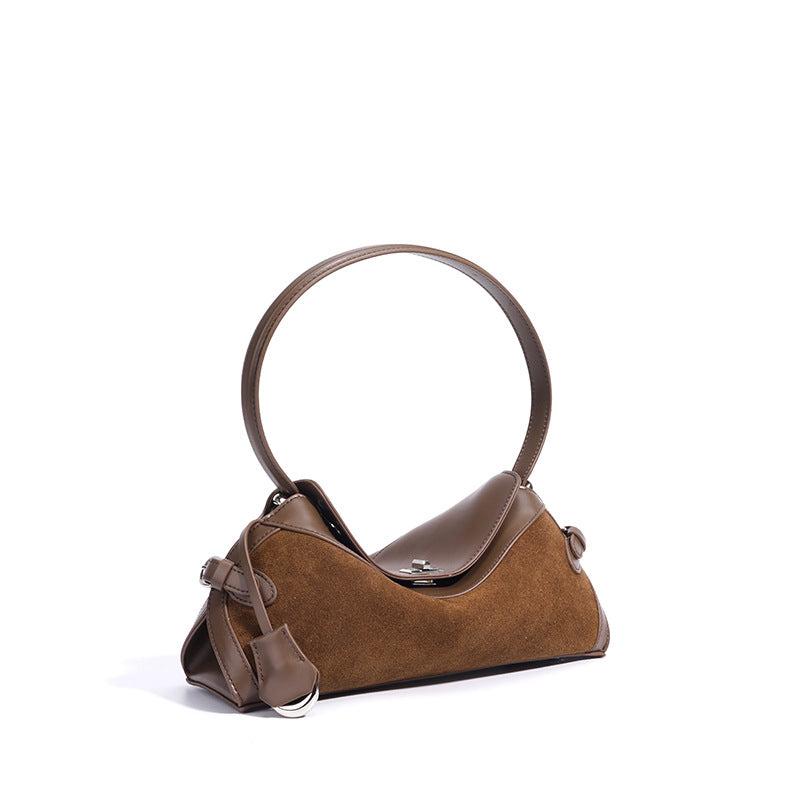 curved suede shoulder bag with flap closure – AURA