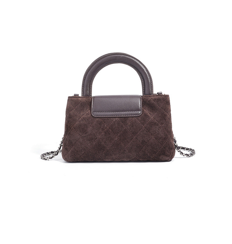 quilted suede top-handle bag with leather flap - TESSLA