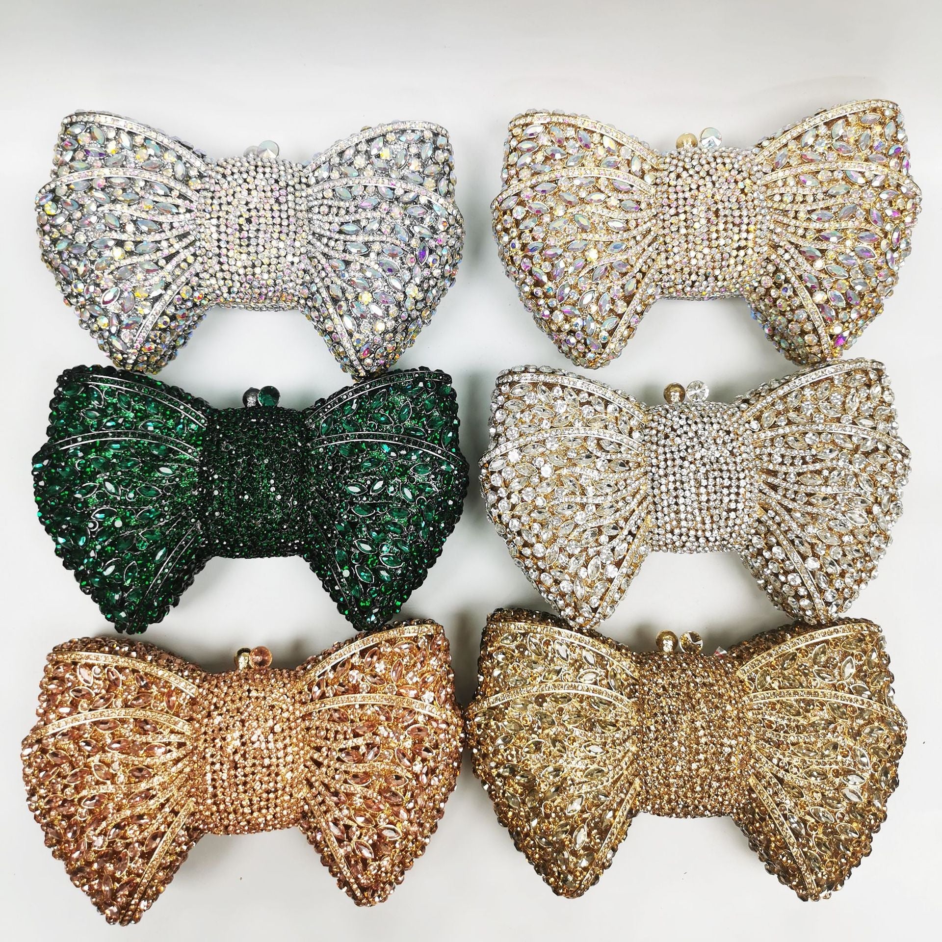 crystal bow-shaped clutch with emerald stones - Efrosini