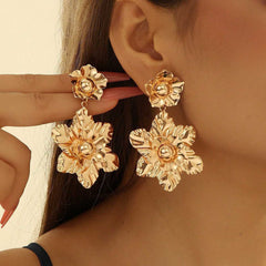 floral hoop earring with blue crystal centers – AURELIA