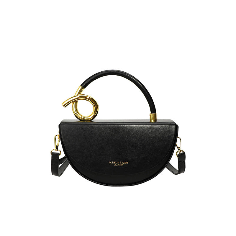 half-moon leather handbag with gold spiral handle – ORENA