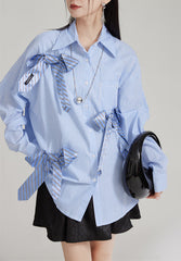 Oversized button-up shirt with striped ribbon accents - Zundi