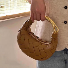 woven crescent bag with sculpted gold handle – AURELIA