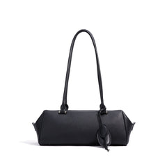 barrel-shaped shoulder bag with twin charm detail – LILURA