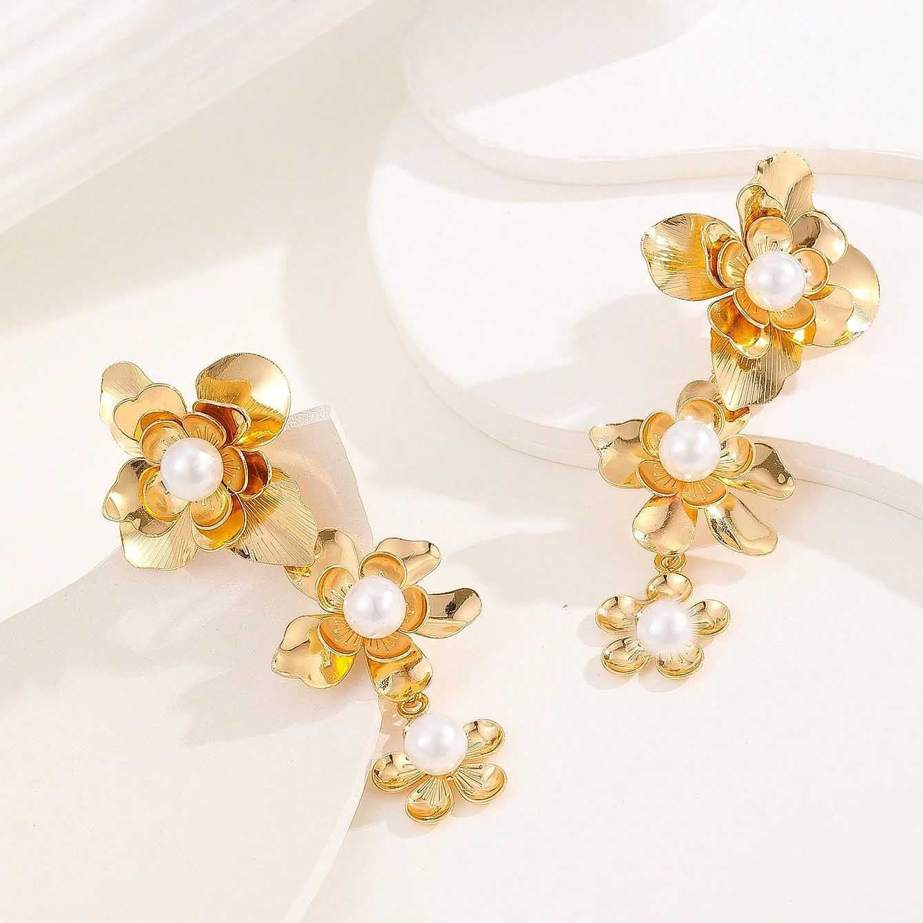 floral hoop earring with blue crystal centers – AURELIA